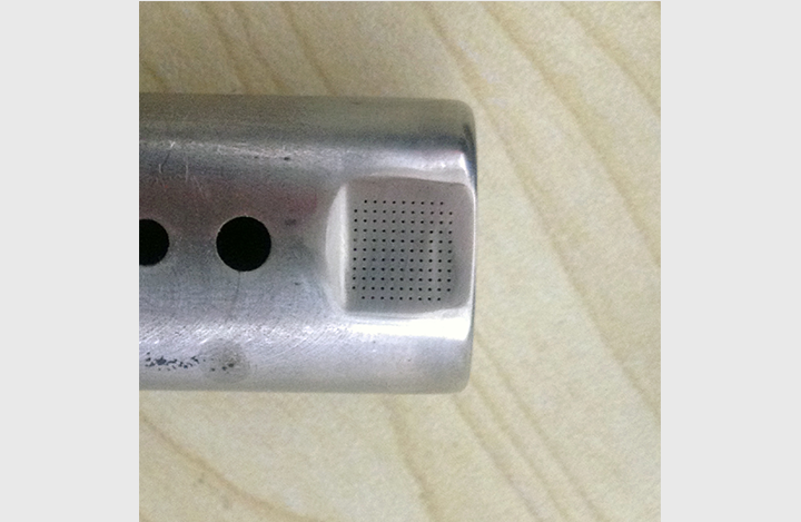 0.1mm hole in stainless steel